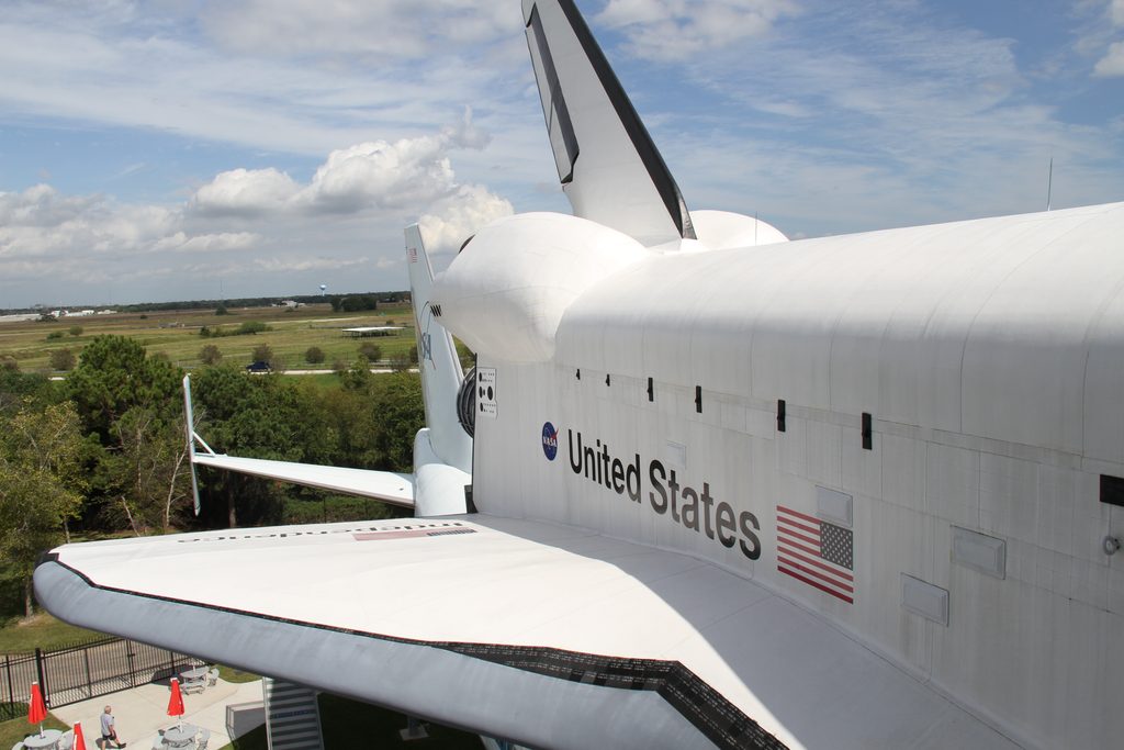 A photgraphic image of a shuttle of the period on top of a 747 plane at Independence Plaza, Houston.